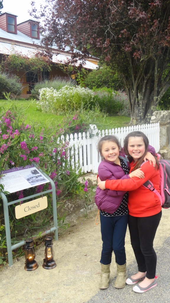 Miss 8 (right) and her cousin were too scared to enter the parsonage.