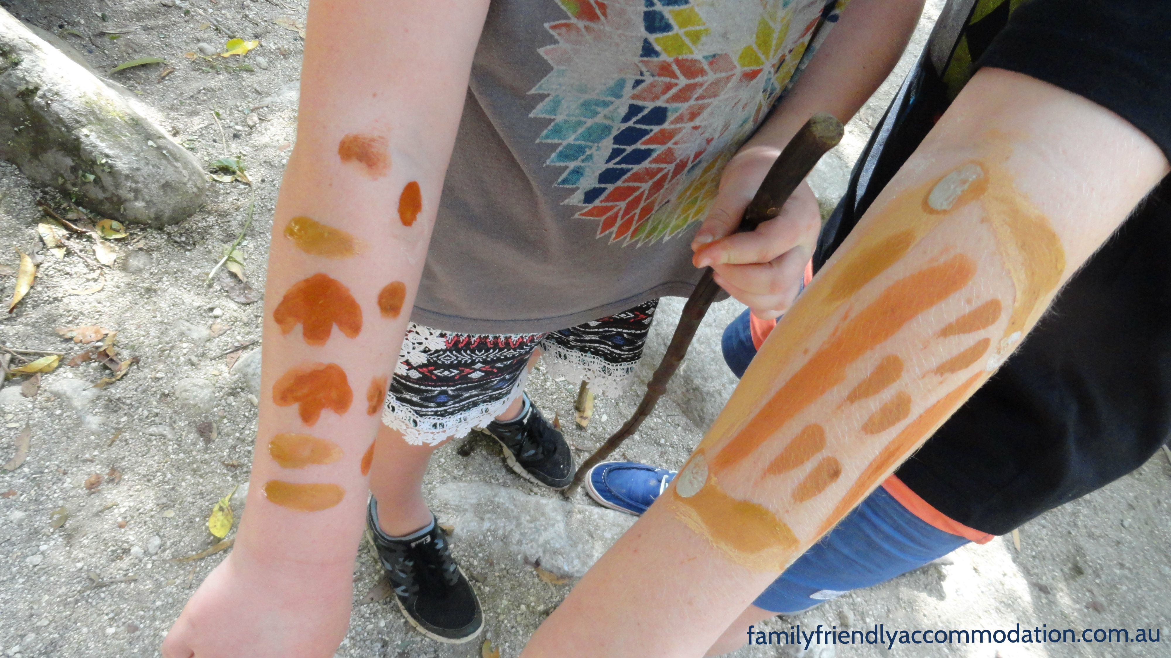 Learning body art on the Dreamtime Walking tour at Mossman Gorge.