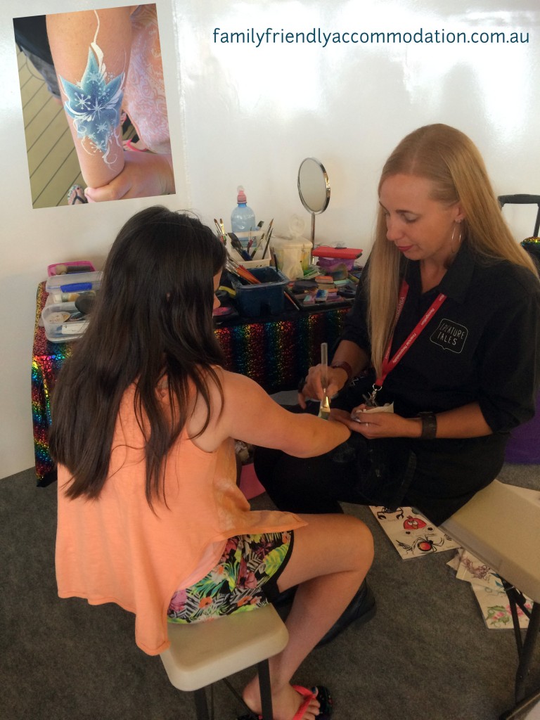 Facepainting (or in this case, arm painting) was one of the activities offered for children on the day cruise.